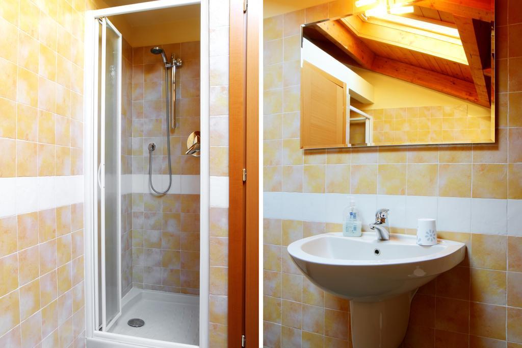 Camera Familiare con Bagno in Comune